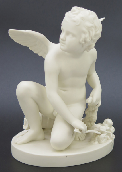 Figurin, parian, Gustavsberg, sekelskiftet 1900, sittande amorin, h 25 cm