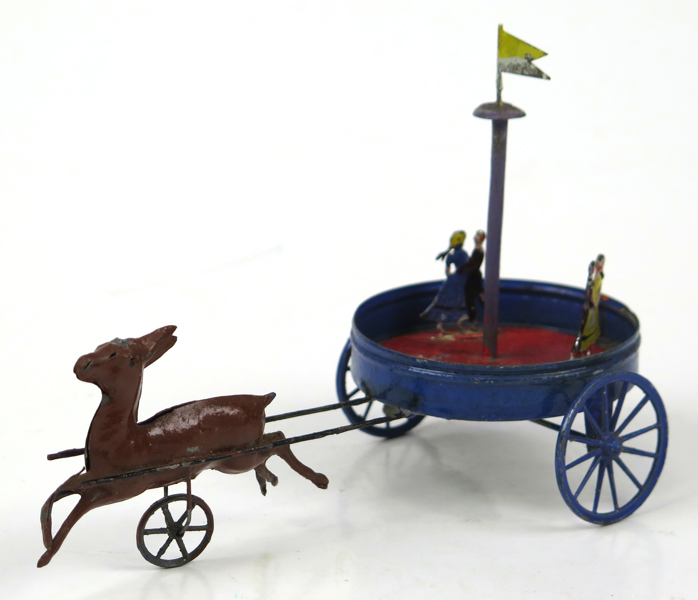 Okänd tillverkare, 1800-talets 2 hälft, leksak, bemålad metall, roterande dansbana dragen av rådjur (?), l 16 cm_37032a_8dc33b95013d644_lg.jpeg