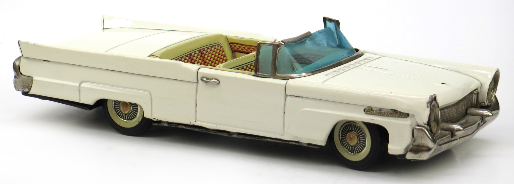 Bilmodell, litograferad plåt, The Lincoln Continental III, Bandai, Japan, 1960-tal, l 30 cm, slitage