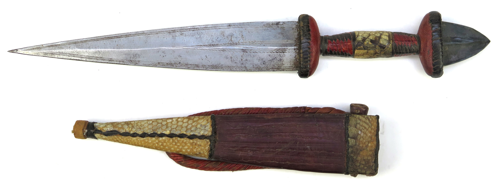 Kniv i balja, trä smide och läder, så kallad Telek, Touareg, 1900-talets mit eller 2 hälft, total l 31  cm_38247a_lg.jpeg
