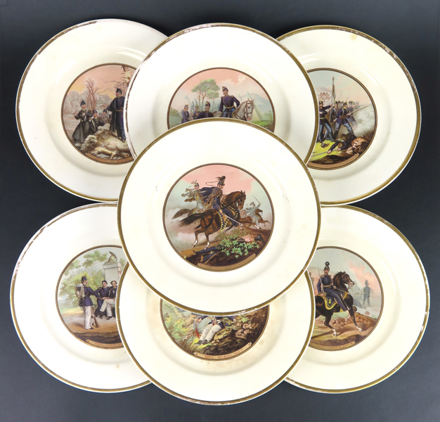 Assietter, 7 st, flitgods, Gustafsberg, 1860-tal, motiv ur Julius Mankells "Anteckningar rörande Svenska Regementers Historia", diameter 21 cm, någon nagg och hårspricka