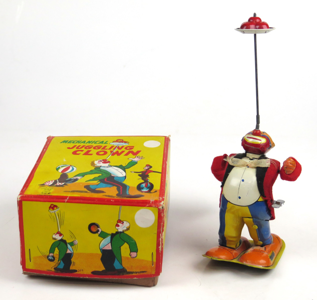 Mekanisk leksak, litograferad plåt, "Mechanical juggling clown", Japan, höjd 22 cm, i originalkartong