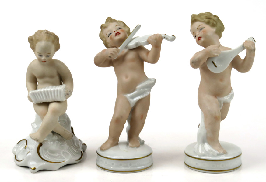 Figuriner 3 st, delvis bemålat porslin, Schaubach Wallendorf, musicerande putti, h 12 - 14 cm